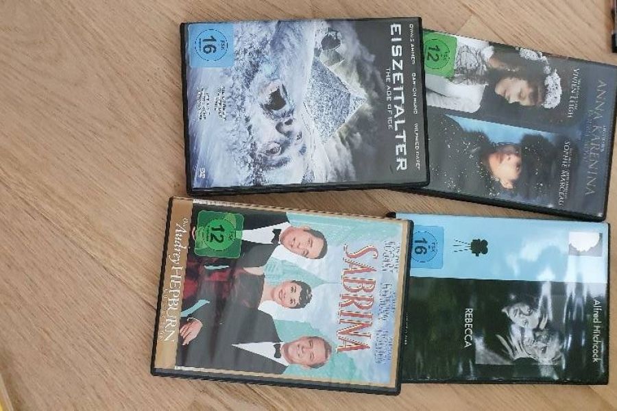 DVD Sammlung Sabrina, Eiszeitalter, Rebecca, Anna Karenina - Bild 1